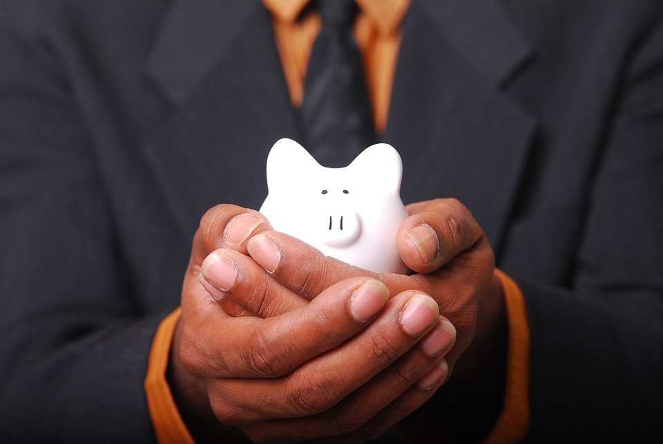 holding piggy bank