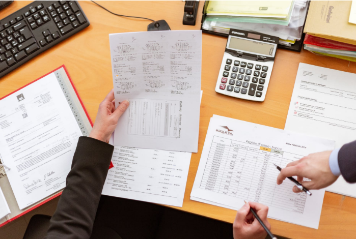a person reviewing reports